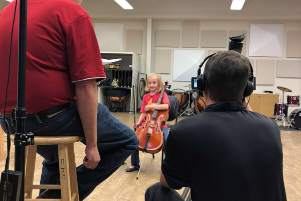 young celloist being interviewed